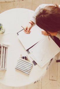 female-drawing-sketch-on-desk-with-designing-equip-PAZLPFS.jpg