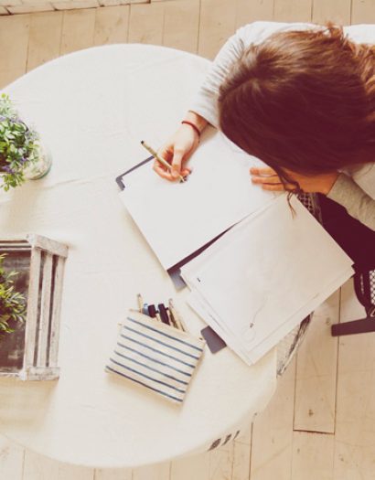 female-drawing-sketch-on-desk-with-designing-equip-PAZLPFS.jpg